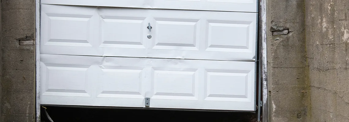 Garage Door Got Hit By A Car Dent Removal in North Chicago, IL