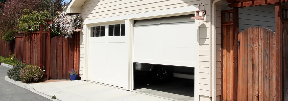 Fix Metal Garage Door Jerking in North Chicago, Illinois